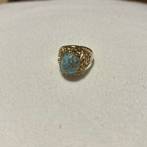 Beautiful 18k Gold overlay fashion Ring with Blue stone. Size 7
